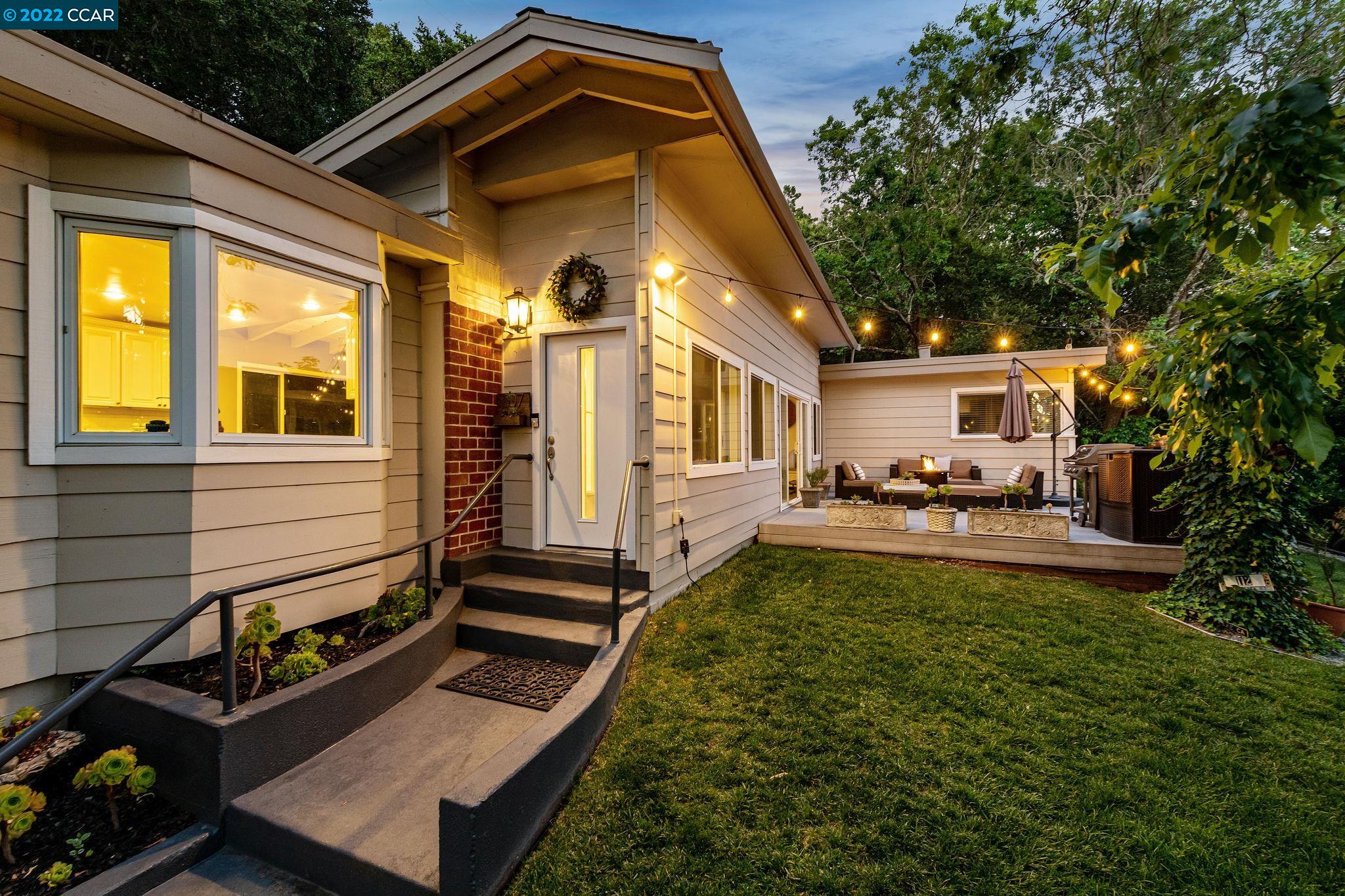 107 Moraga Way Orinda, CA 94563 - Photo 1 of 1 a front view of a house with swimming pool