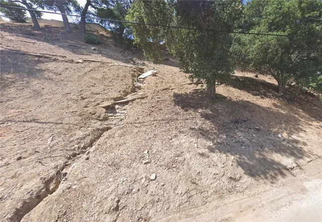 a view of snow on a road