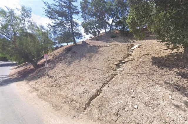 a view of a yard covered in snow