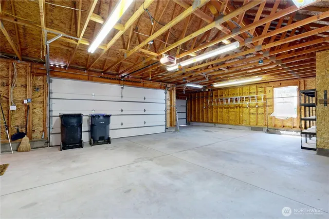 a view of a room with wooden walls