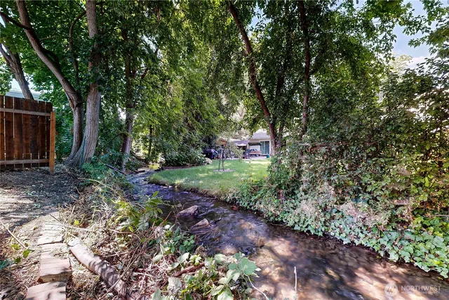 a view of a garden with trees