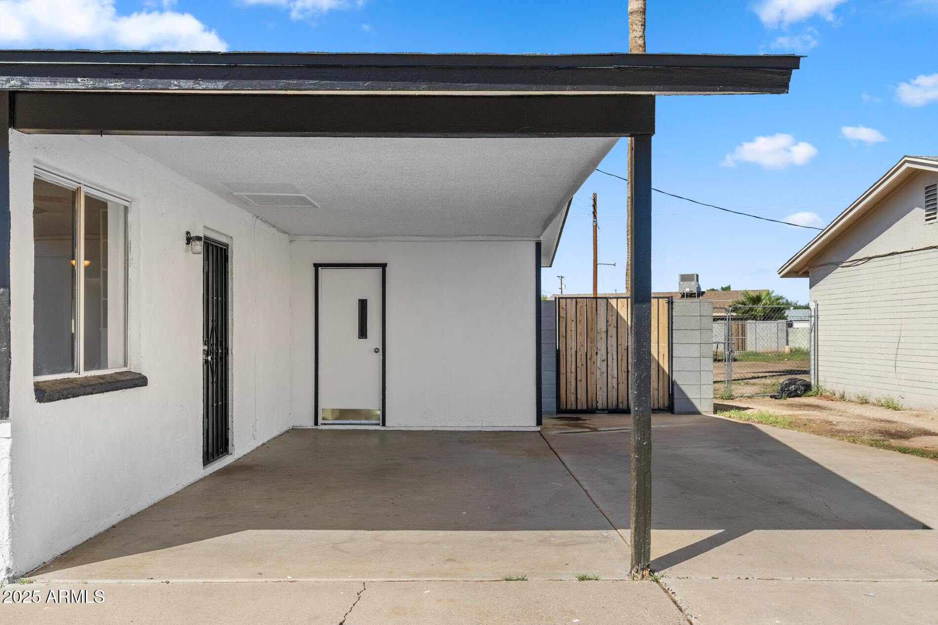 2230 East Chipman Road Phoenix, AZ 85040 - Photo 3 of 26 a view of a car garage