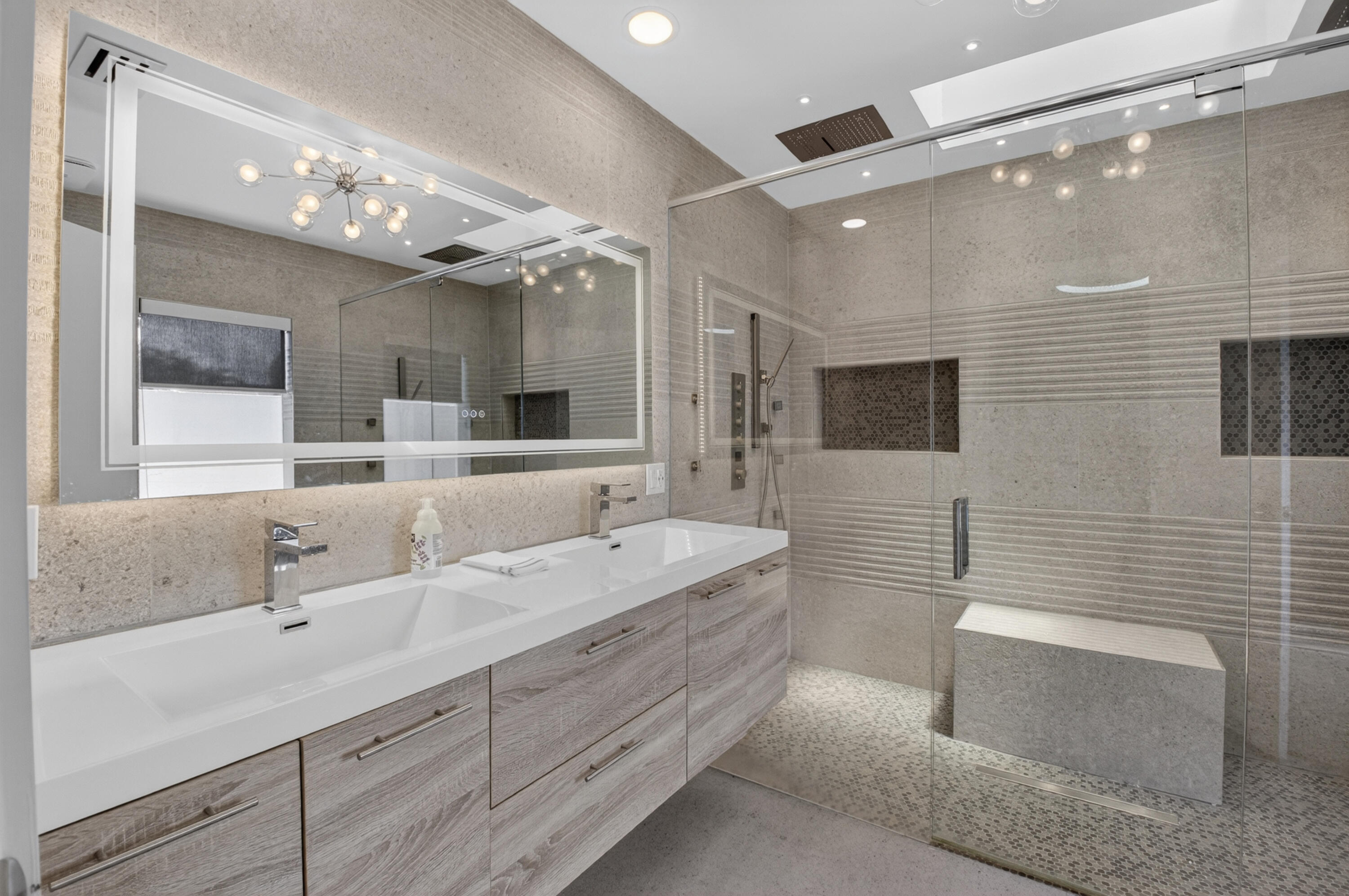 7374 Woodmont Court Boca Raton, FL 33434 - Photo 28 of 95 a spacious bathroom with a double vanity sink mirror and bathtub