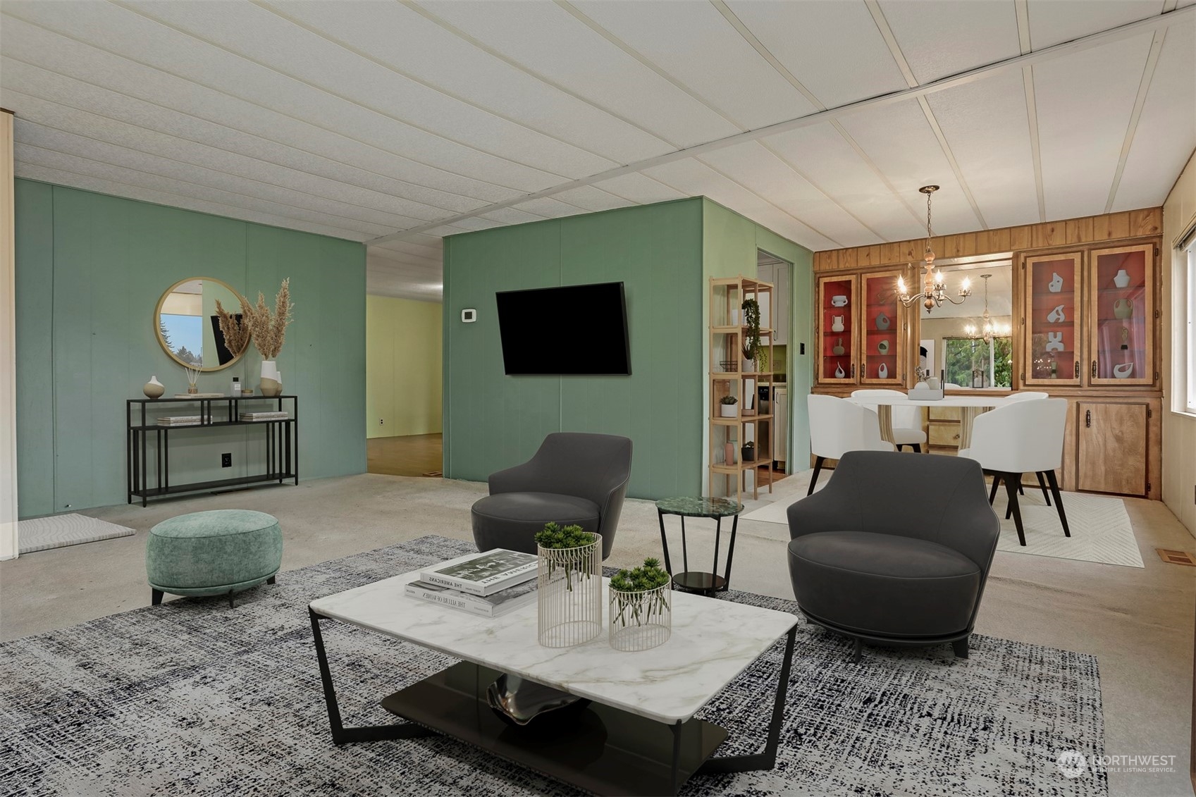 714 Wandering Creek Drive Bothell, WA 98021 - Photo 13 of 39 a living room with furniture and a flat screen tv