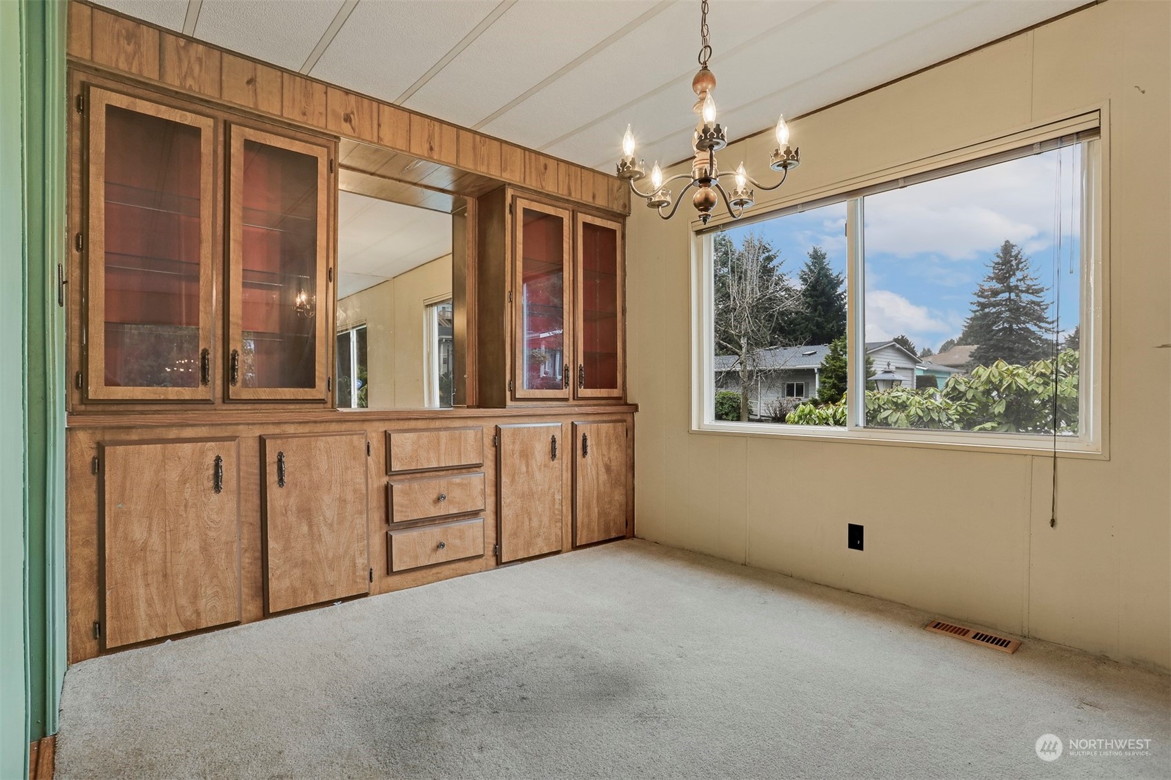 714 Wandering Creek Drive Bothell, WA 98021 - Photo 20 of 39 wooden floor in an empty room with a window