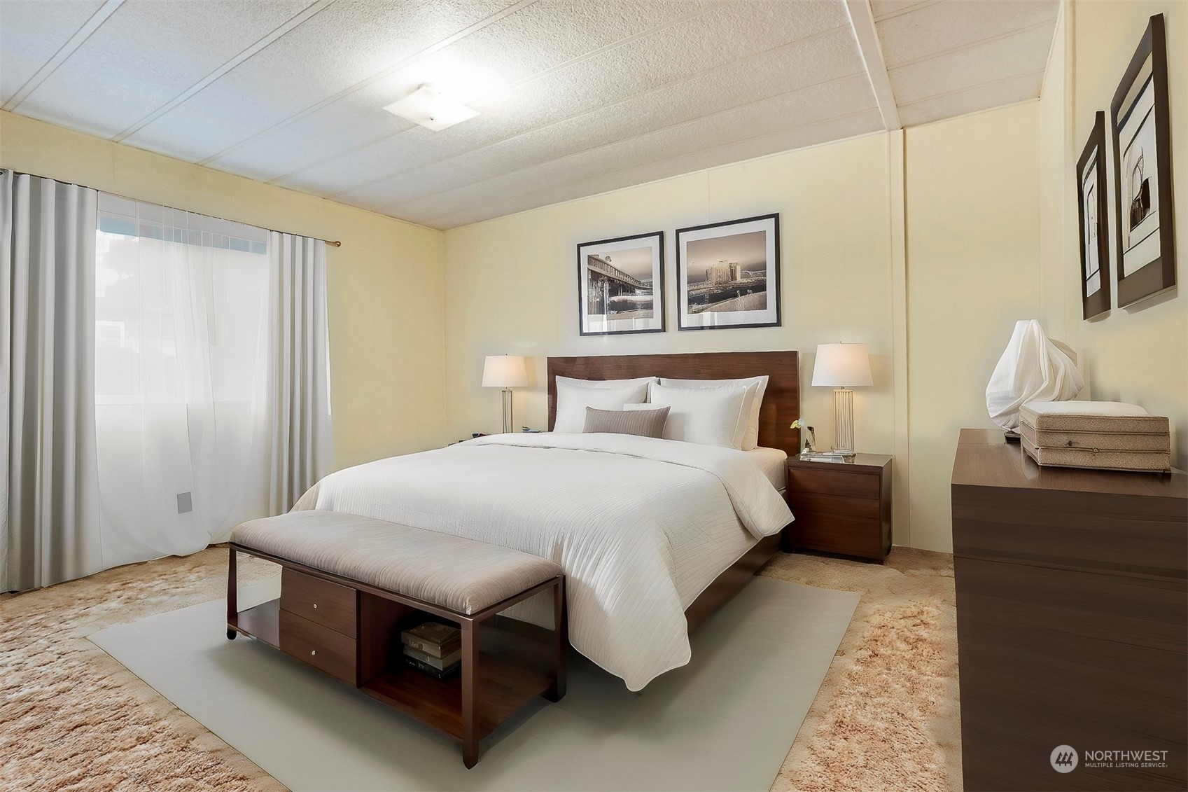 714 Wandering Creek Drive Bothell, WA 98021 - Photo 22 of 39 a bedroom with a bed and wooden floor