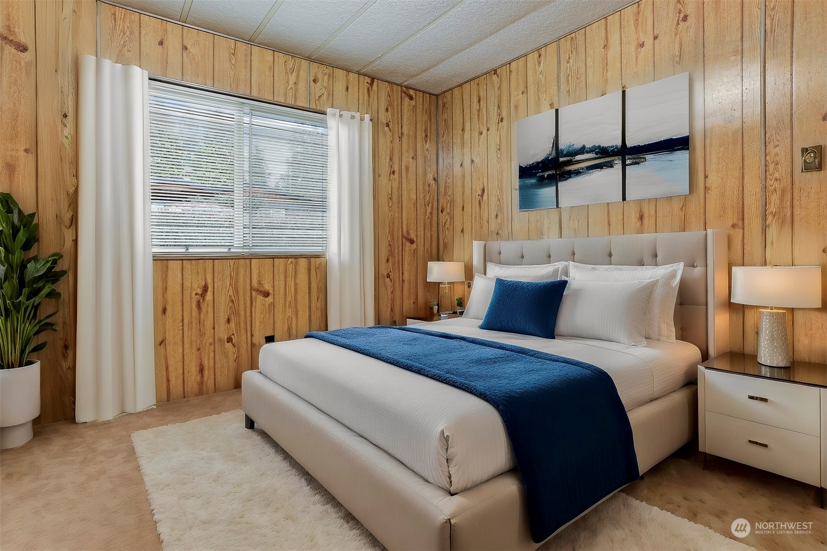 714 Wandering Creek Drive Bothell, WA 98021 - Photo 28 of 39 a spacious bedroom with a bed and a window