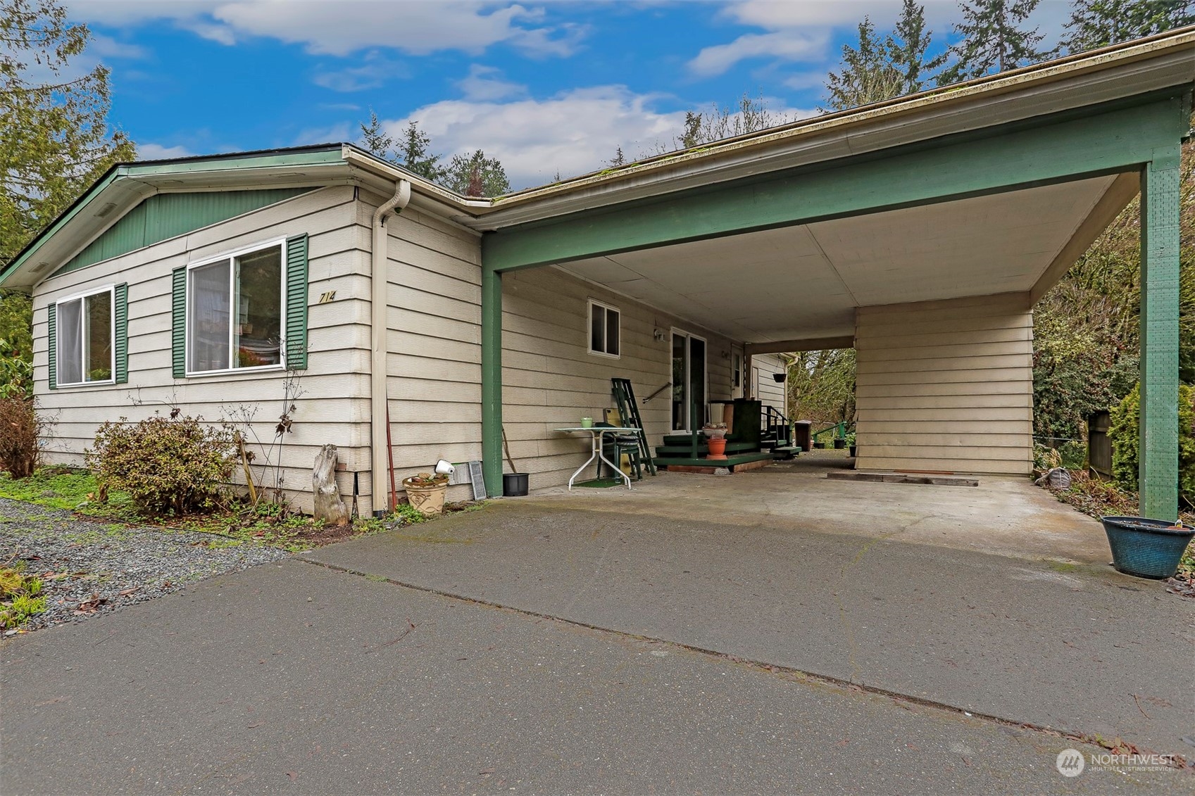 714 Wandering Creek Drive Bothell, WA 98021 - Photo 3 of 39 a view of a house with a patio
