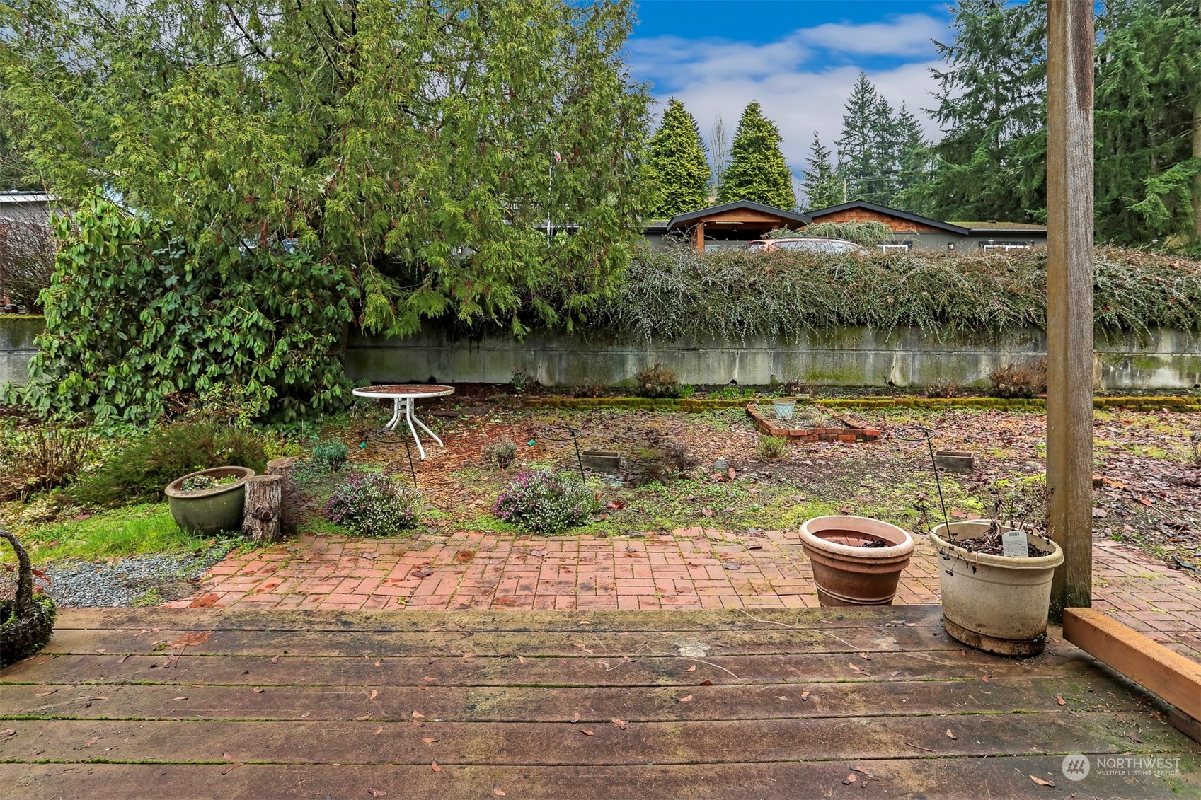 714 Wandering Creek Drive Bothell, WA 98021 - Photo 34 of 39 a view of a backyard with sitting area