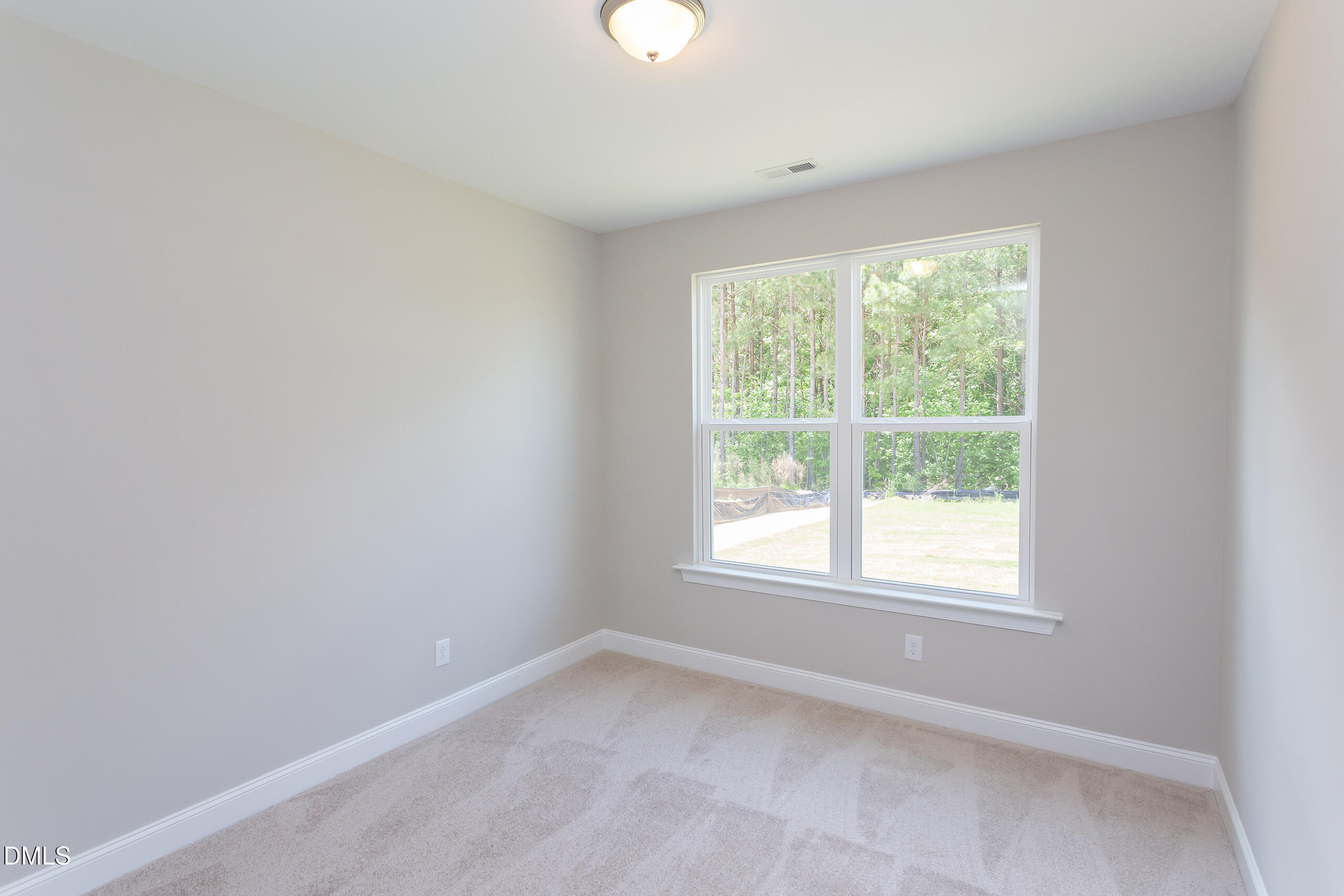 263 Gilliland Road Siler City, NC 27344 - Photo 14 of 31 an empty room with a window