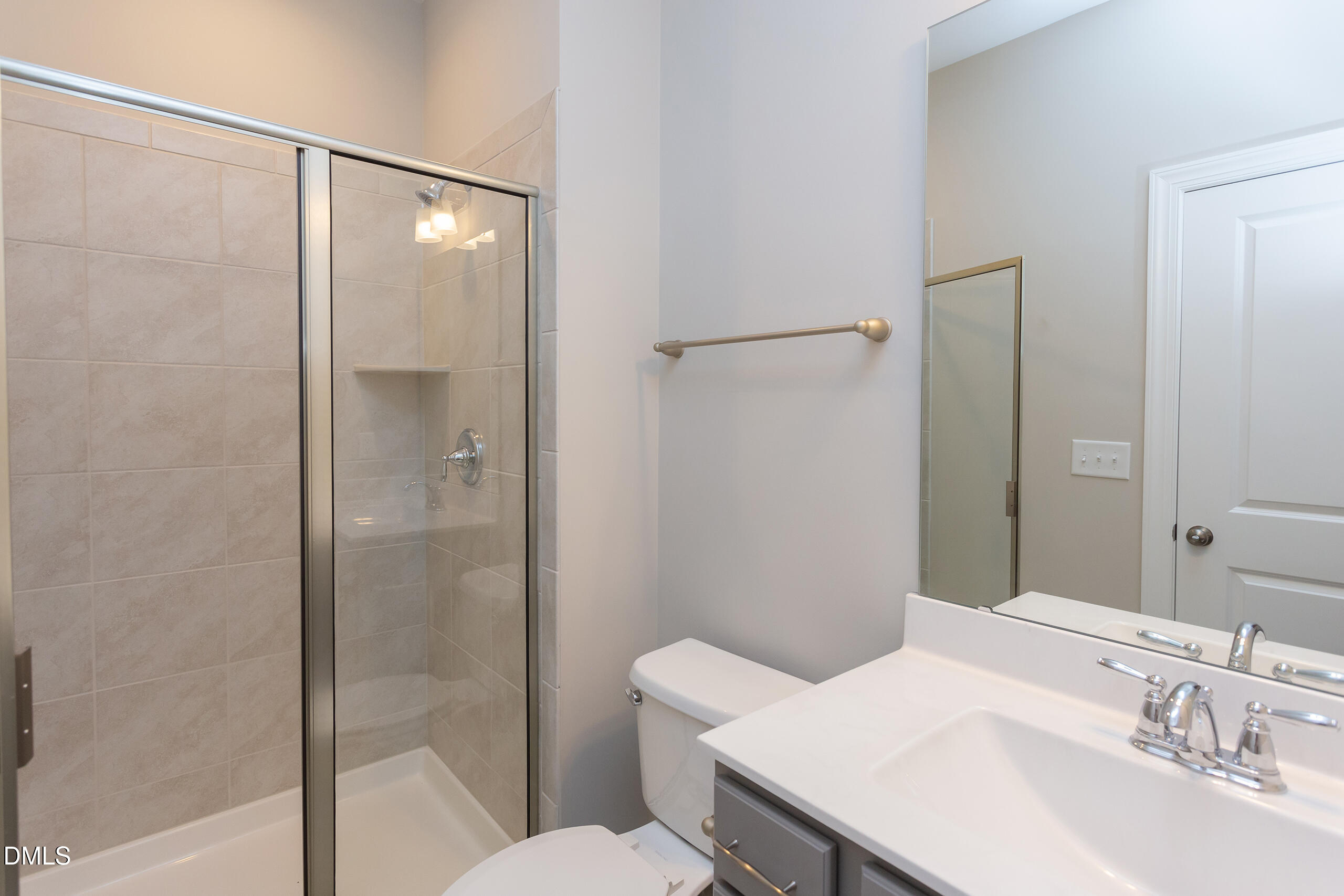 263 Gilliland Road Siler City, NC 27344 - Photo 15 of 31 a bathroom with a sink toilet and shower