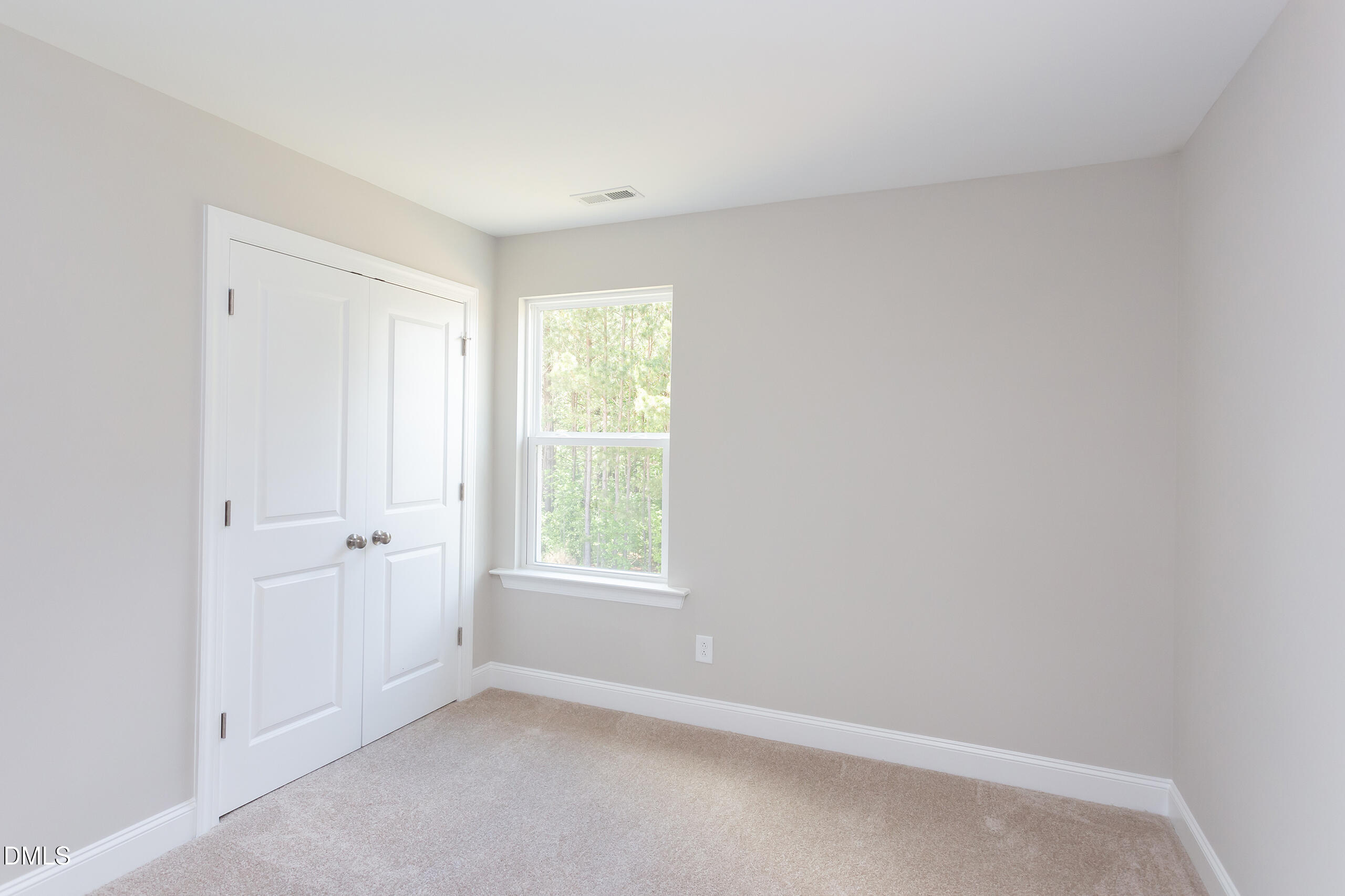 263 Gilliland Road Siler City, NC 27344 - Photo 16 of 31 an empty room with windows
