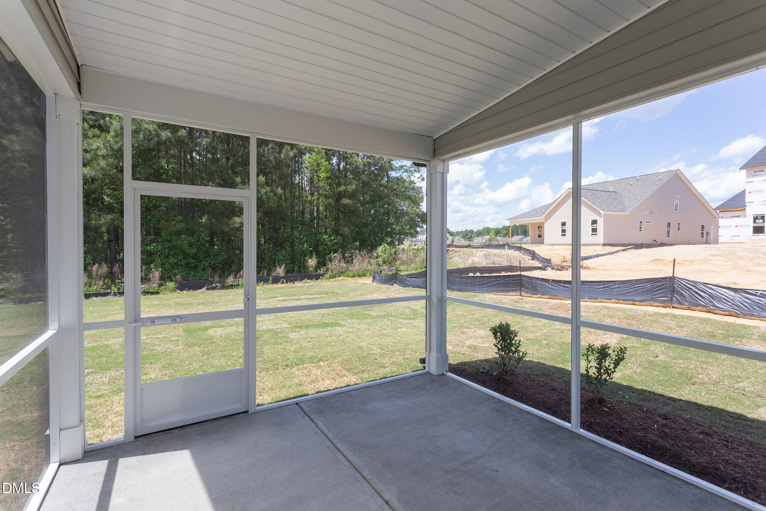 263 Gilliland Road Siler City, NC 27344 - Photo 25 of 31 a view of a porch with a floor to ceiling window