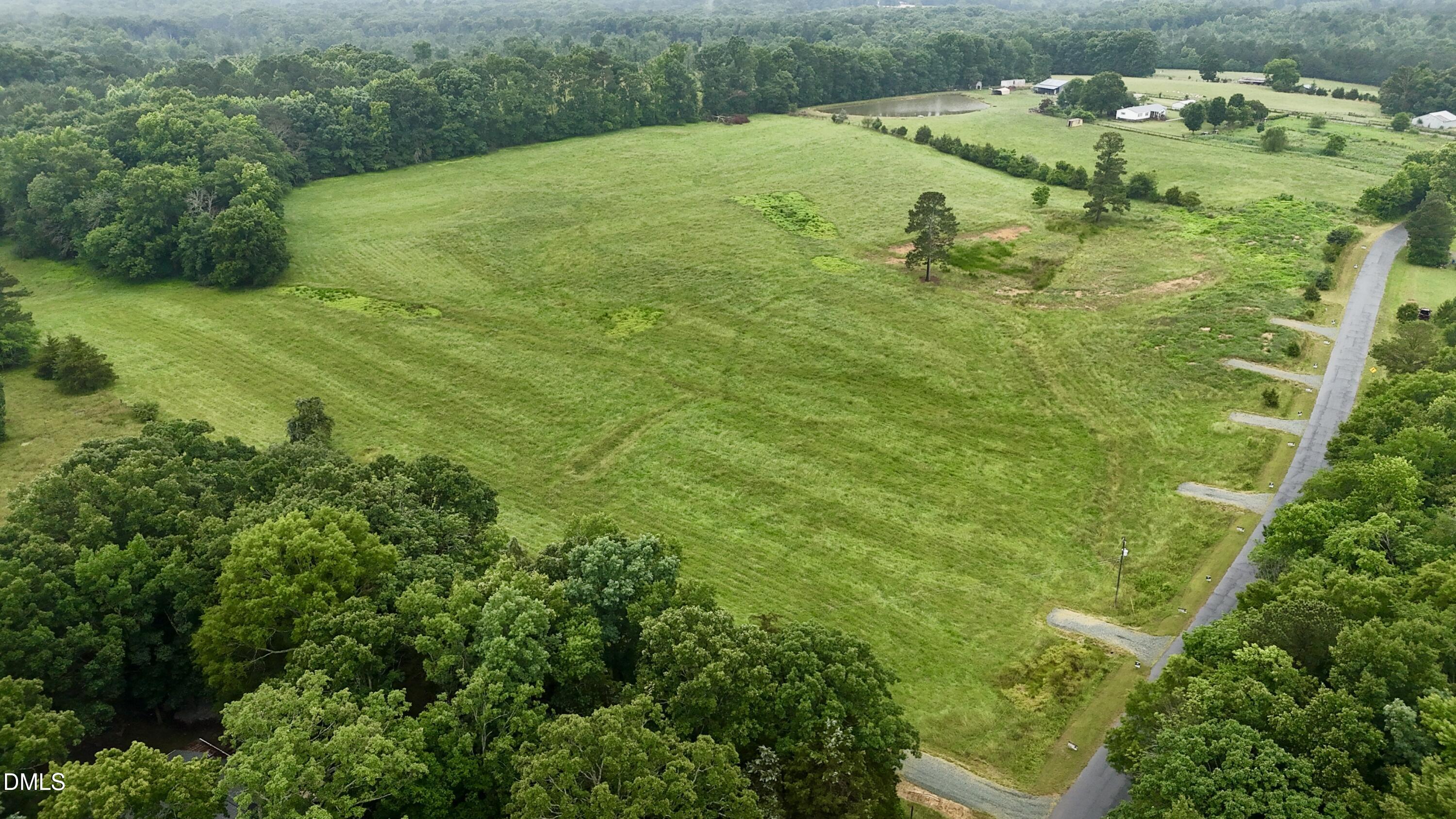 263 Gilliland Road Siler City, NC 27344 - Photo 29 of 31 a view of a street with a yard