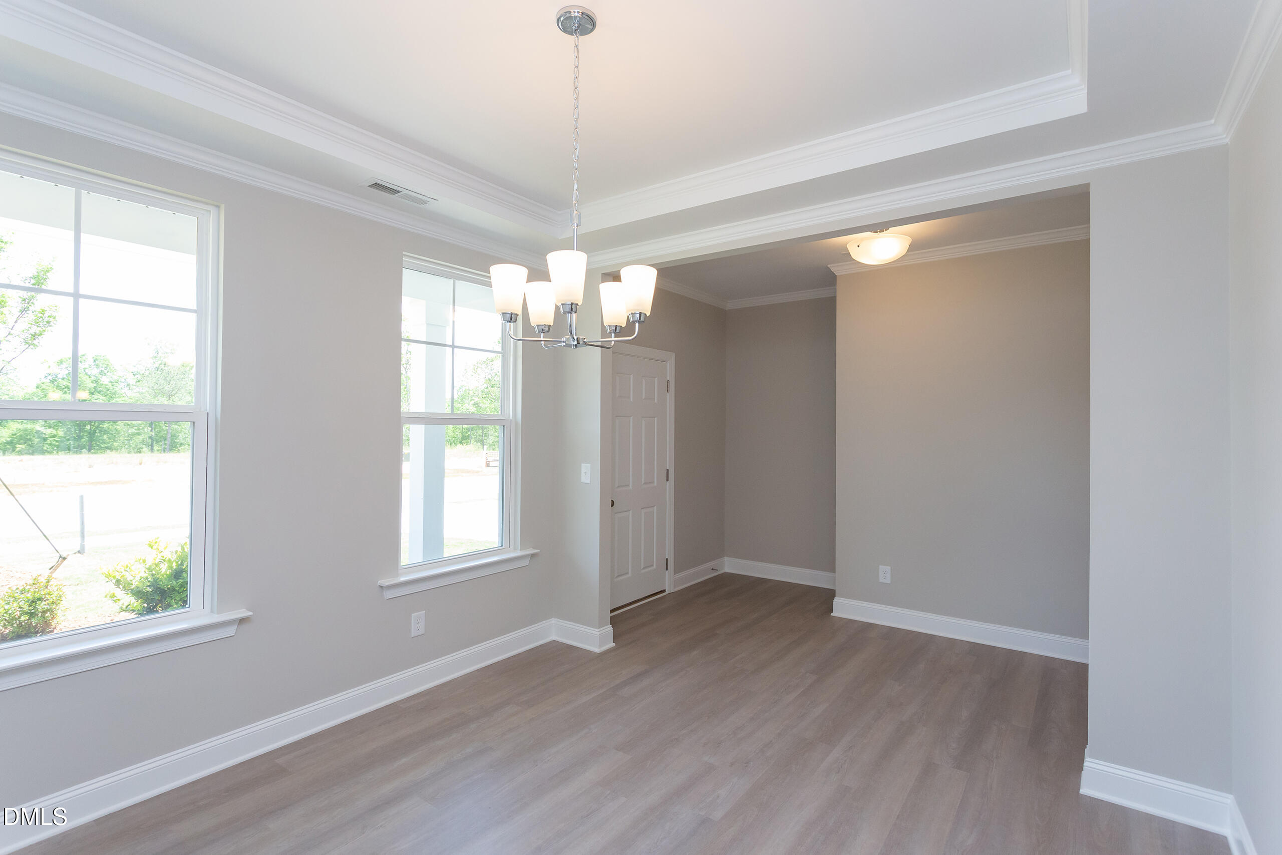 263 Gilliland Road Siler City, NC 27344 - Photo 3 of 31 wooden floor in an empty room with a window
