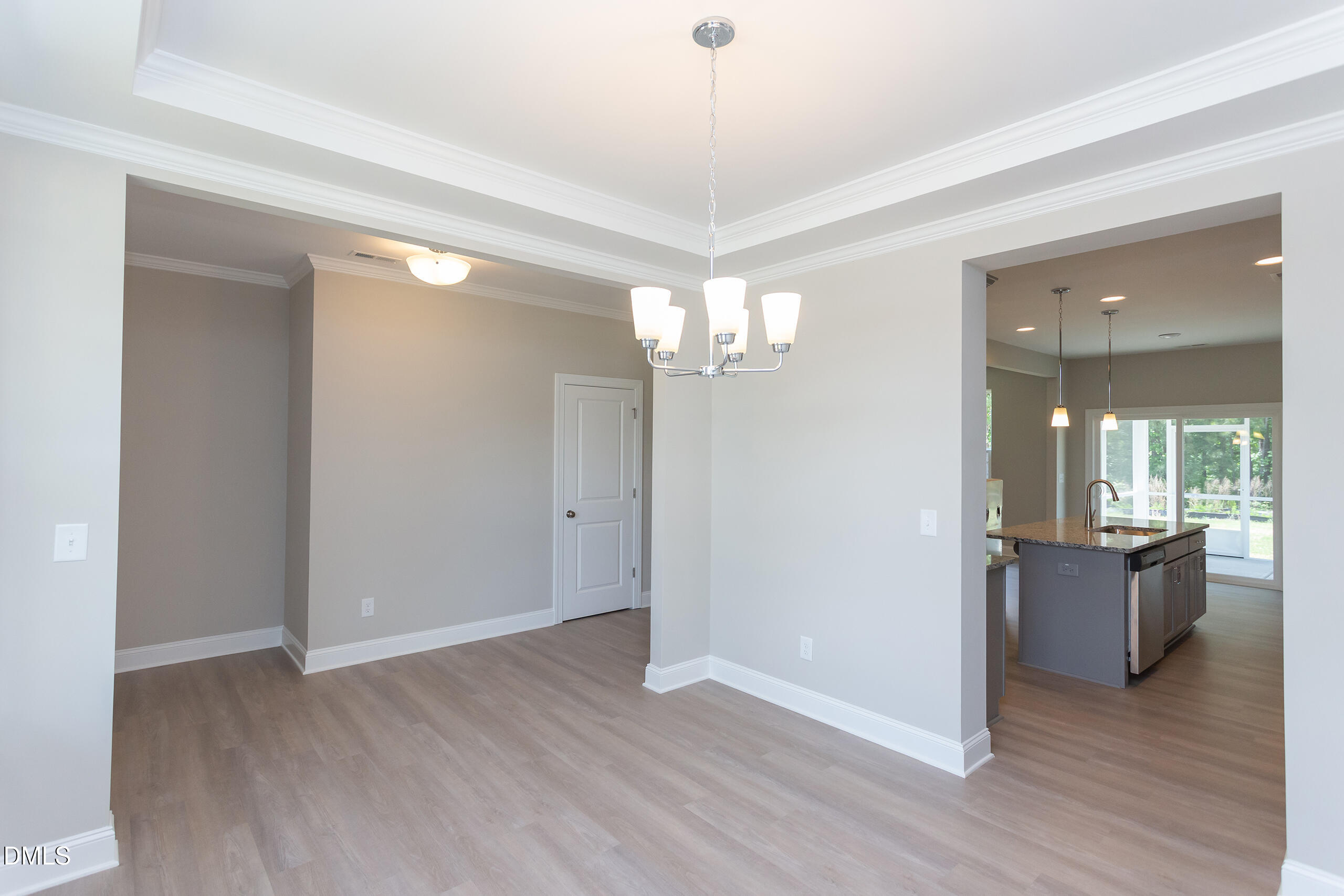 263 Gilliland Road Siler City, NC 27344 - Photo 4 of 31 a view of a room with wooden floor and furniture