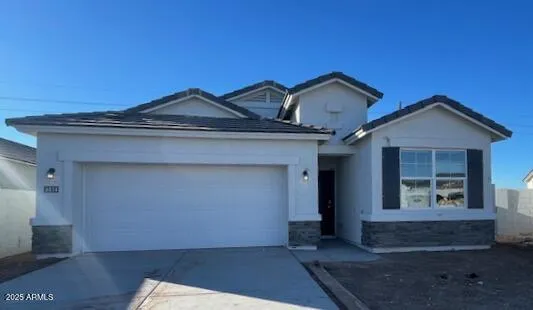 a view of a house with a entrance gate