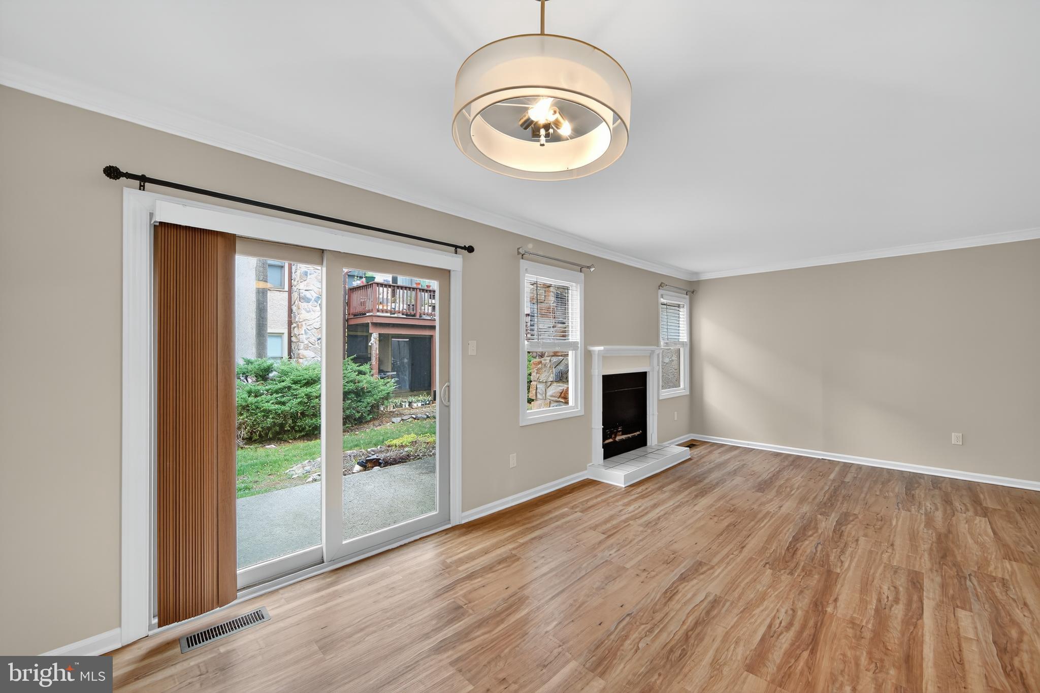 107 Reveille Road, Unit 107 Chesterbrook, PA 19087 - Photo 13 of 22 wooden floor in an empty room with a window