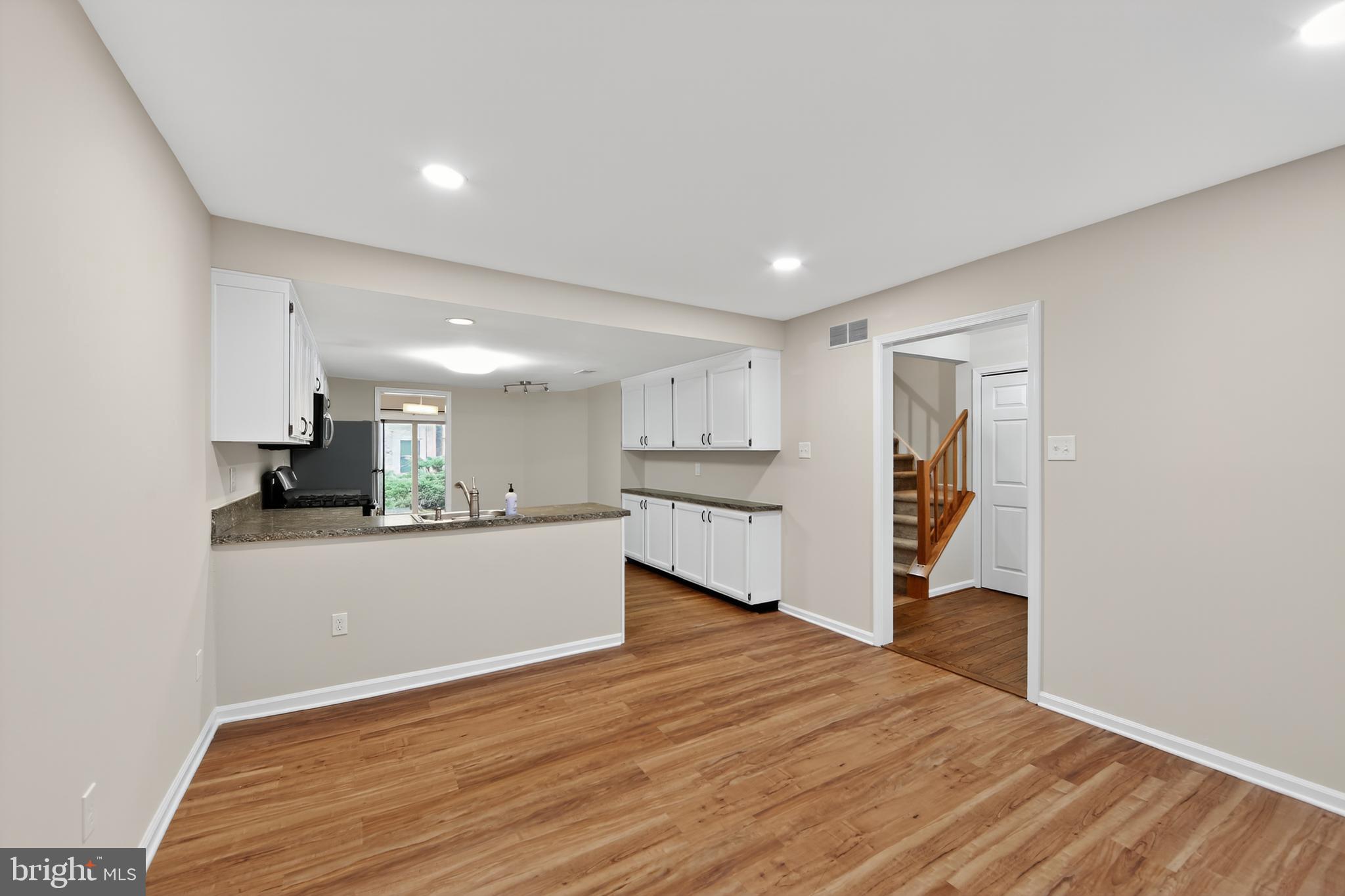 107 Reveille Road, Unit 107 Chesterbrook, PA 19087 - Photo 14 of 22 a view of kitchen and wooden floor