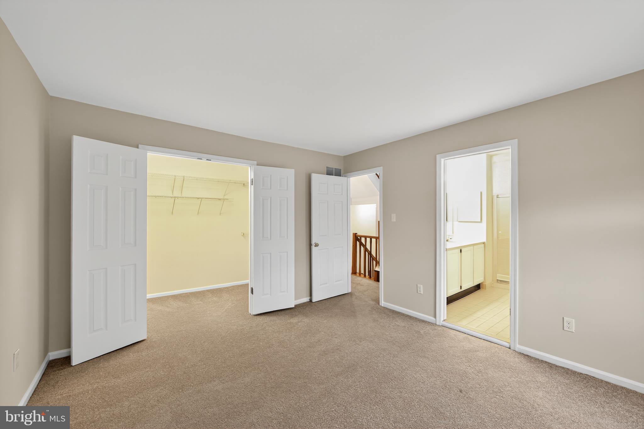 107 Reveille Road, Unit 107 Chesterbrook, PA 19087 - Photo 15 of 22 a view of an empty room with a window