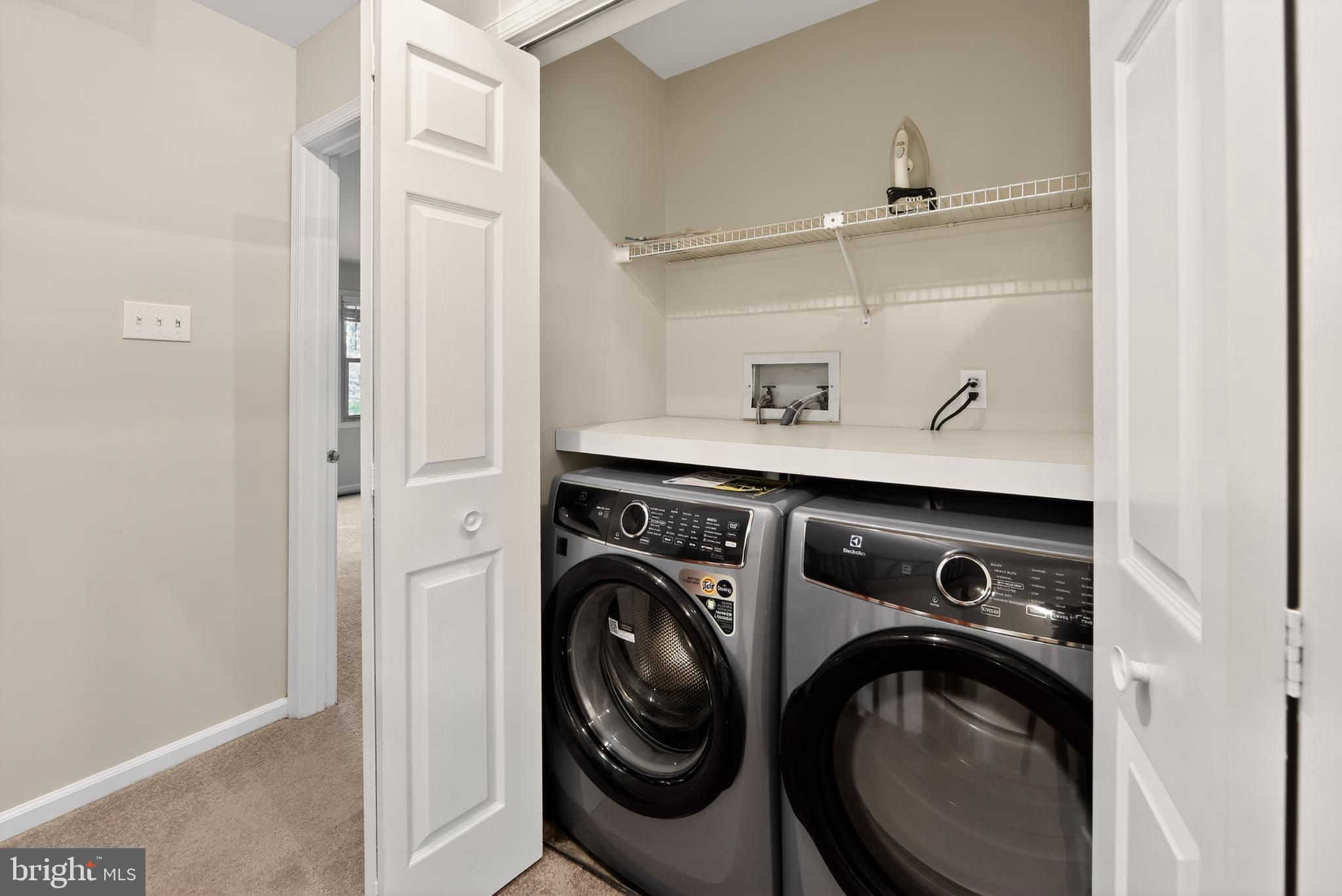 107 Reveille Road, Unit 107 Chesterbrook, PA 19087 - Photo 19 of 22 a utility room with dryer and washer