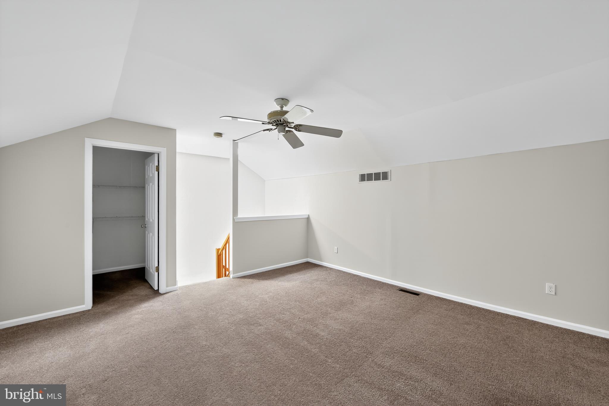 107 Reveille Road, Unit 107 Chesterbrook, PA 19087 - Photo 20 of 22 a view of a room with cabinet and a ceiling fan
