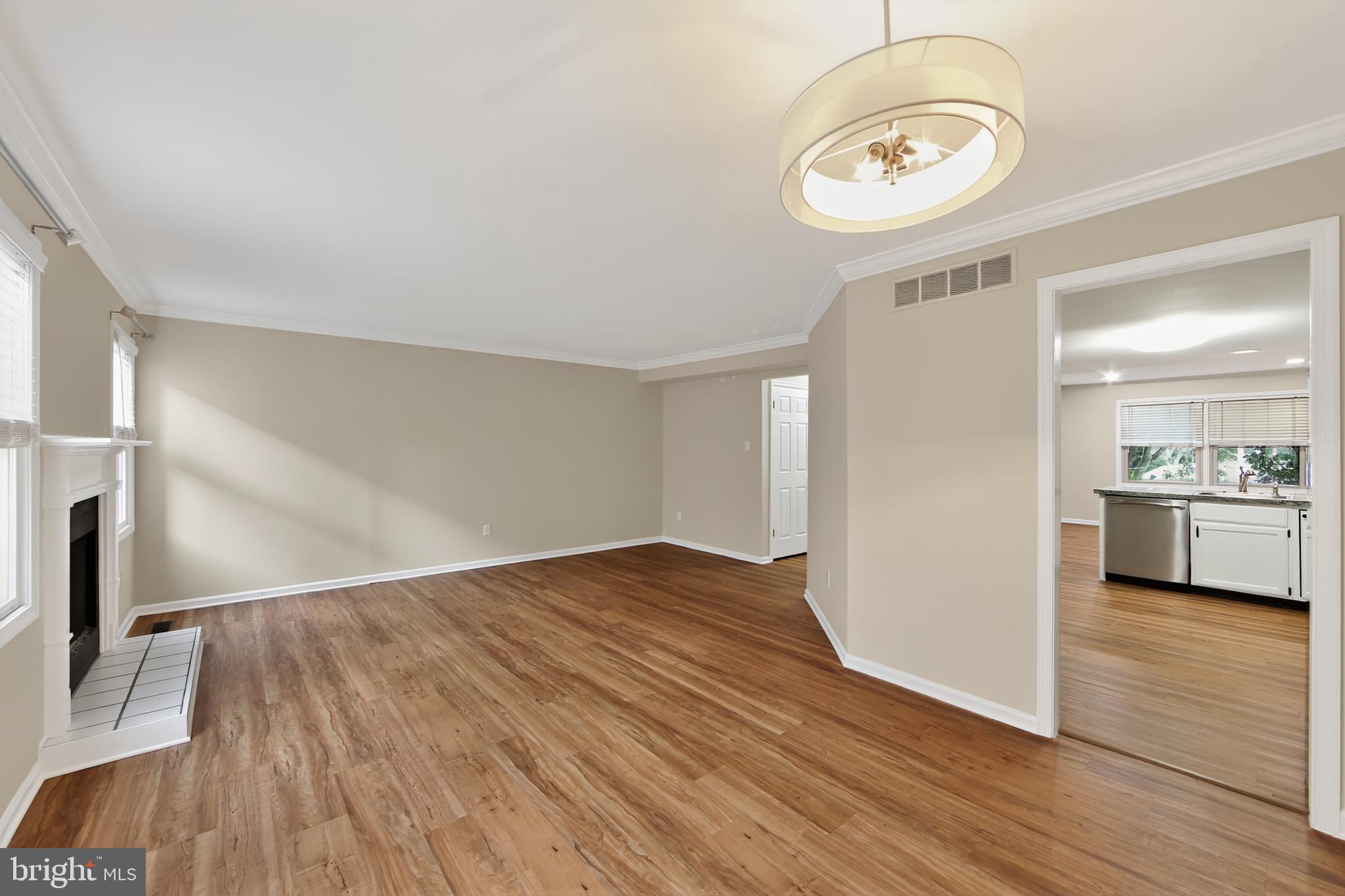 107 Reveille Road, Unit 107 Chesterbrook, PA 19087 - Photo 8 of 22 a view of empty room with wooden floor