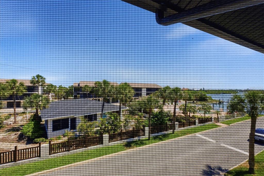 2729 North Beach Road, Unit 211 Englewood, FL 34223 - Photo 40 of 51 a view of a brick building with many windows