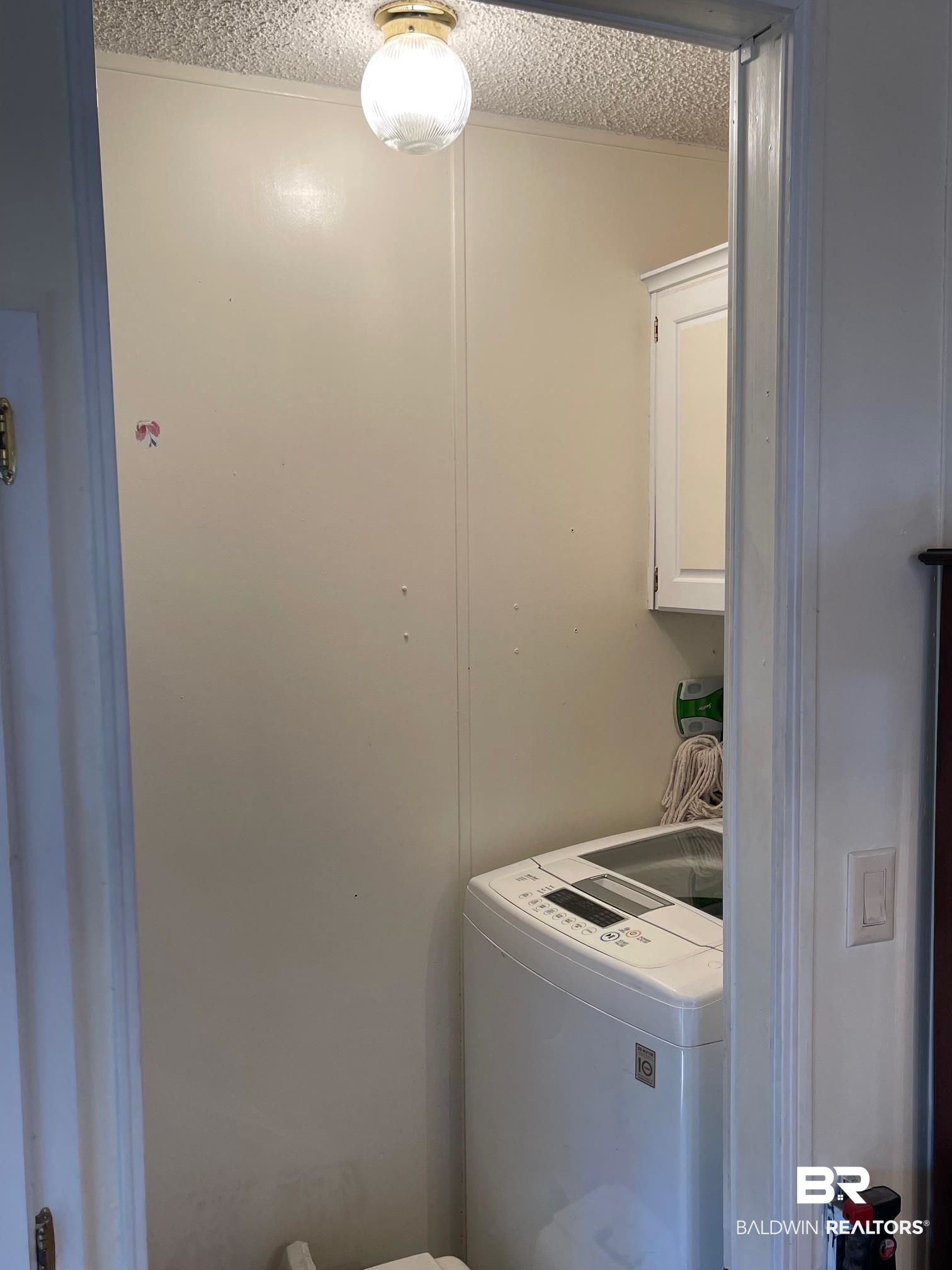1395 Ridgewood Drive Lillian, AL 36549 - Photo 20 of 39 Laundry Room