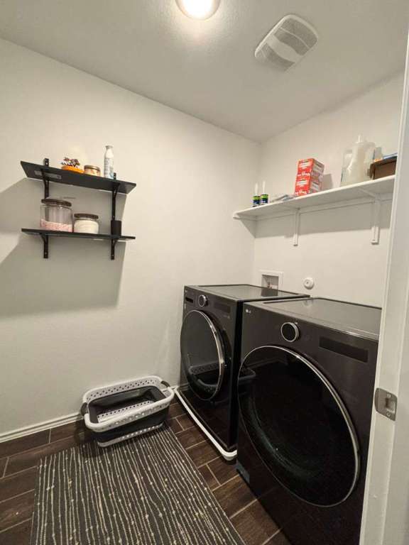 1512 Hope Ranch Road Leander, TX 78641 - Photo 22 of 27 a view of a room with washer and dryer
