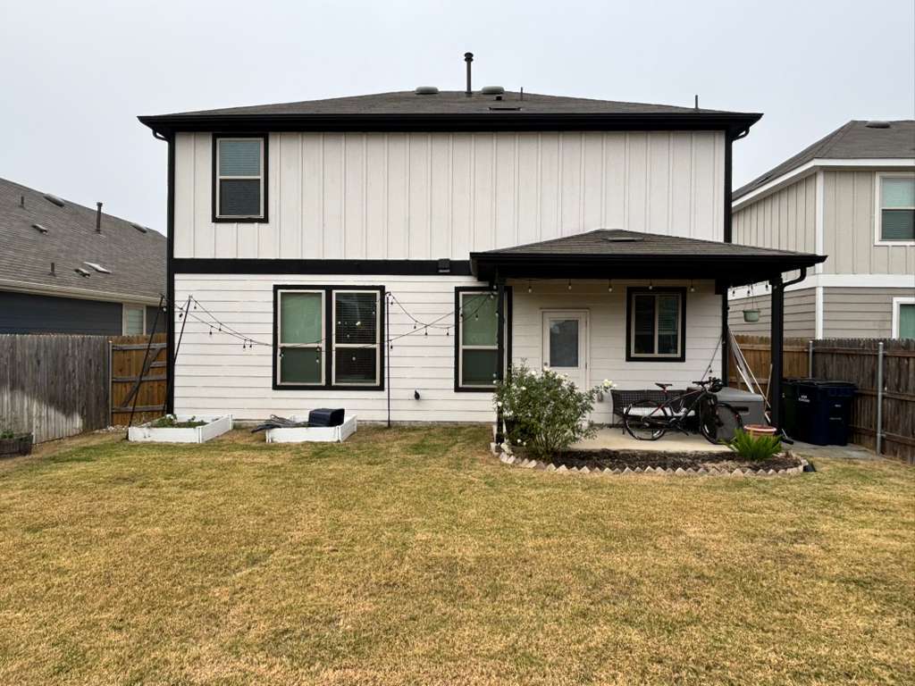 1512 Hope Ranch Road Leander, TX 78641 - Photo 24 of 27 a front view of a house with yard and seating space