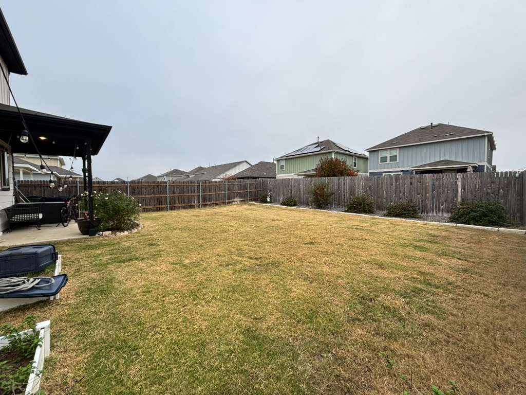 1512 Hope Ranch Road Leander, TX 78641 - Photo 26 of 27 a view of a house with a yard