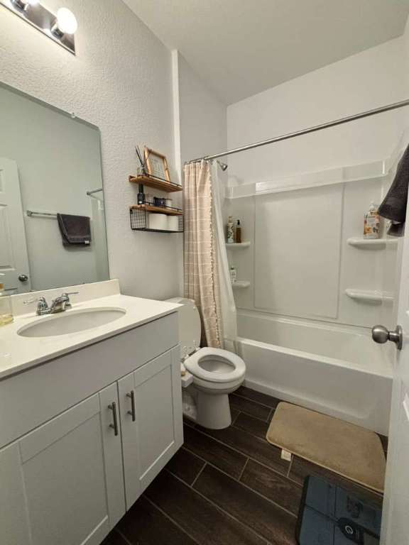 1512 Hope Ranch Road Leander, TX 78641 - Photo 8 of 27 a bathroom with a sink toilet and shower