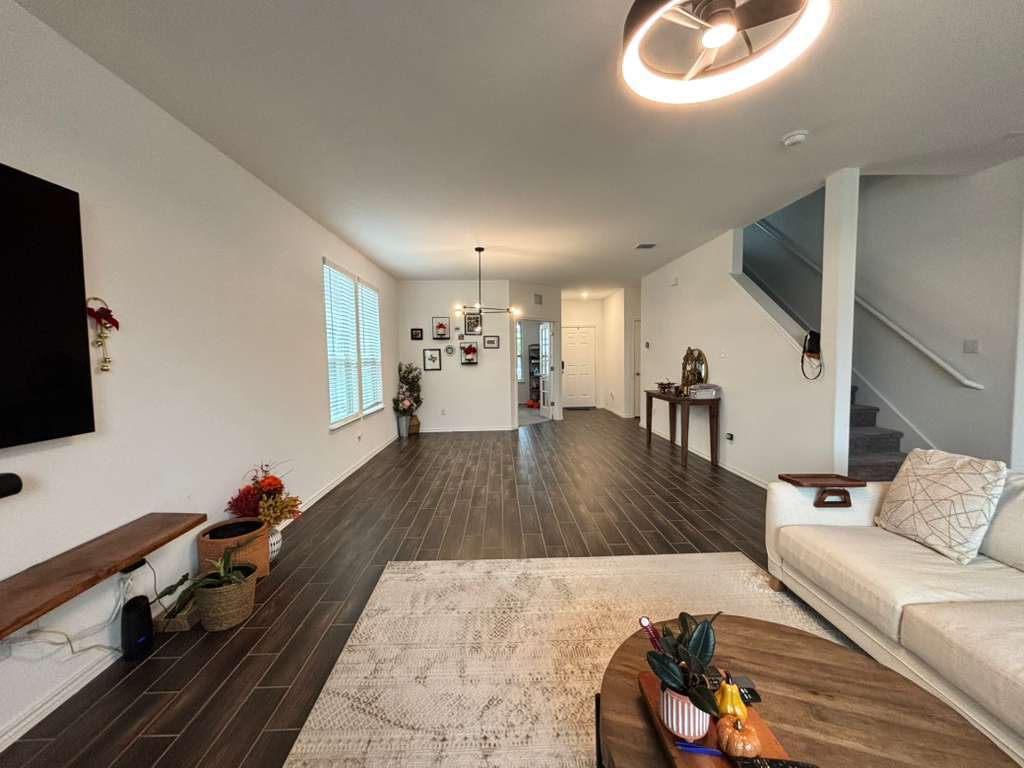 1512 Hope Ranch Road Leander, TX 78641 - Photo 10 of 27 a living room with furniture and a flat screen tv