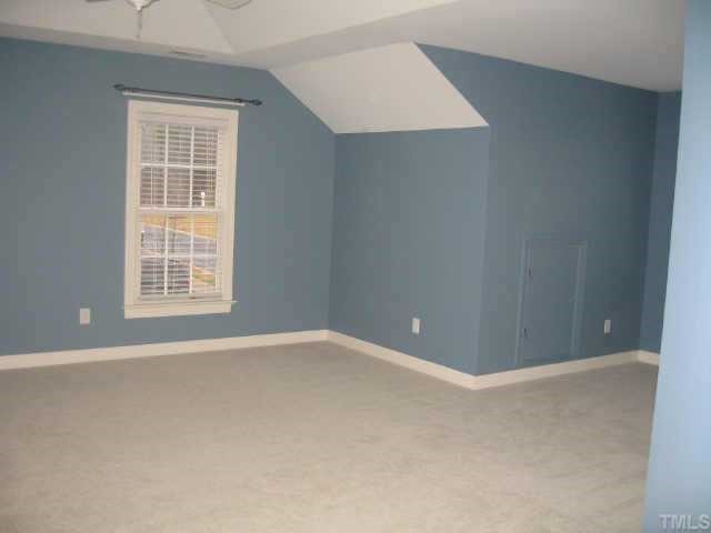 2924 Elmfield Street Raleigh, NC 27614 - Photo 5 of 10 Master bedroom features a trey ceiling, ceiling fan & sitting area.