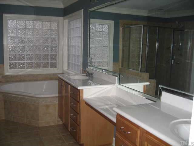2924 Elmfield Street Raleigh, NC 27614 - Photo 6 of 10 Spacious Master bath has a double vanity, large separate shower & whirlpool.