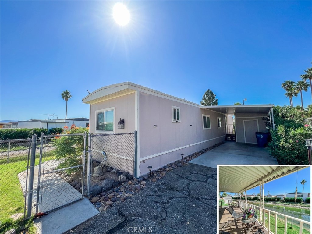 650 Channel Way, Unit 650 Needles, CA 92363 - Photo 2 of 60 a front view of a house with a yard