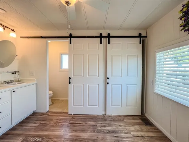a bathroom with a glass shower door
