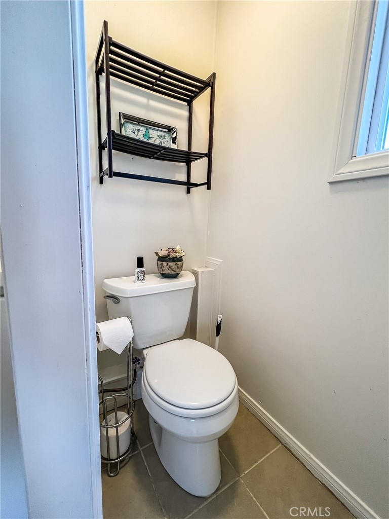 650 Channel Way, Unit 650 Needles, CA 92363 - Photo 27 of 60 a white toilet sitting next to a bathroom sink