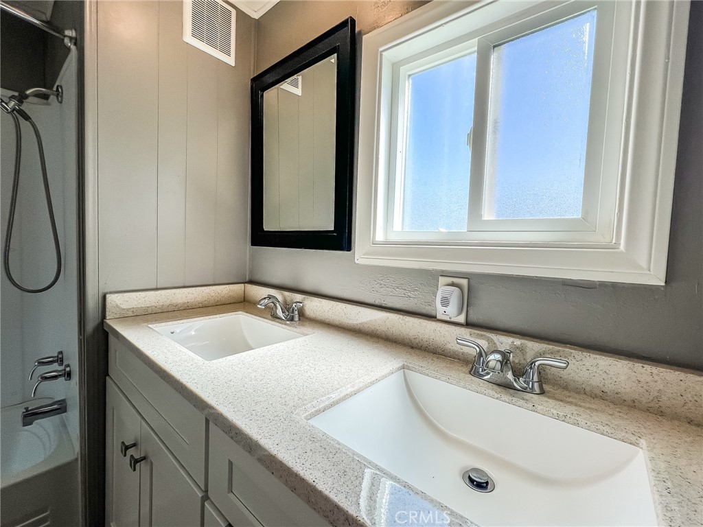 650 Channel Way, Unit 650 Needles, CA 92363 - Photo 39 of 60 a bathroom with a sink and a mirror