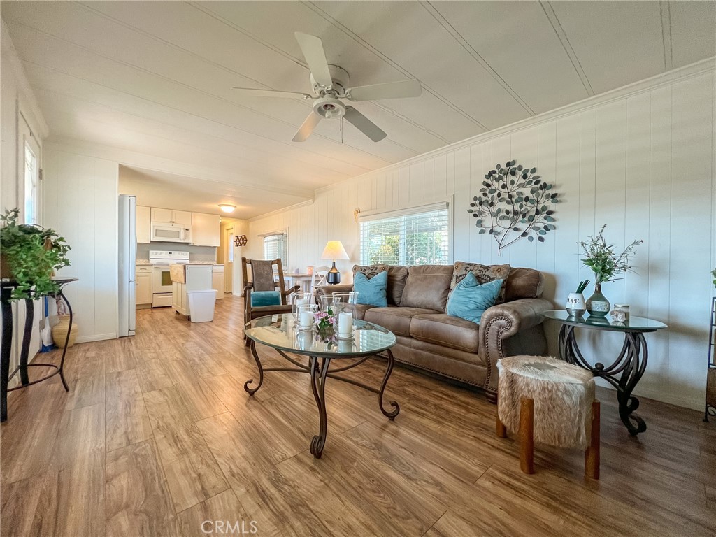 650 Channel Way, Unit 650 Needles, CA 92363 - Photo 8 of 60 a living room with furniture and flowers