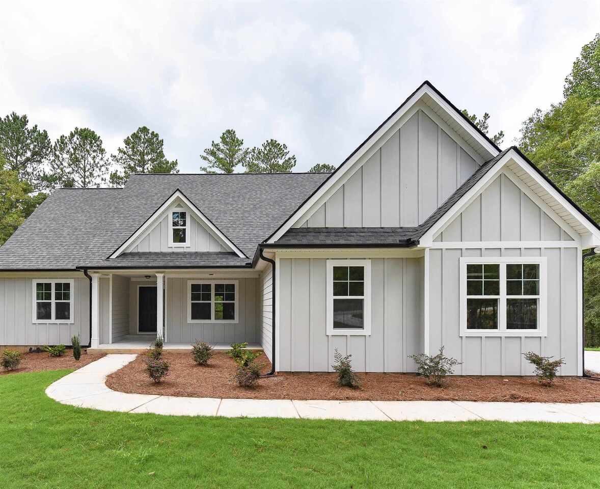 0 Ridgeview Drive Newnan, GA 30263 - Photo 1 of 1 a front view of a house with a yard