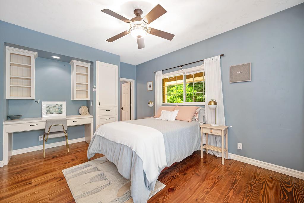 3557 Val Verde Road Loomis, CA 95650 - Photo 32 of 71 a bedroom with a bed wooden floor and window