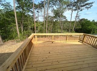 523 Welcome Hill Road Trion, GA 30753 - Photo 16 of 19 a view of balcony with wooden floor and fence
