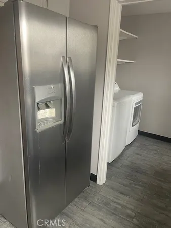 a bathroom with a mirror and a shower