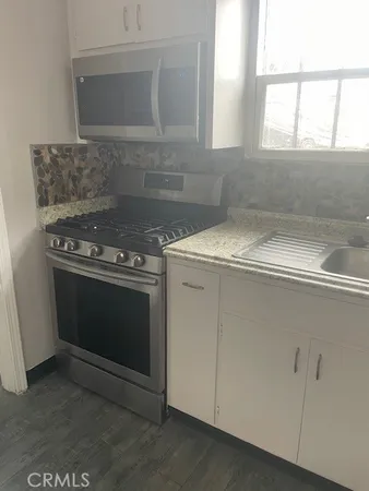 a utility room with washer and dryer