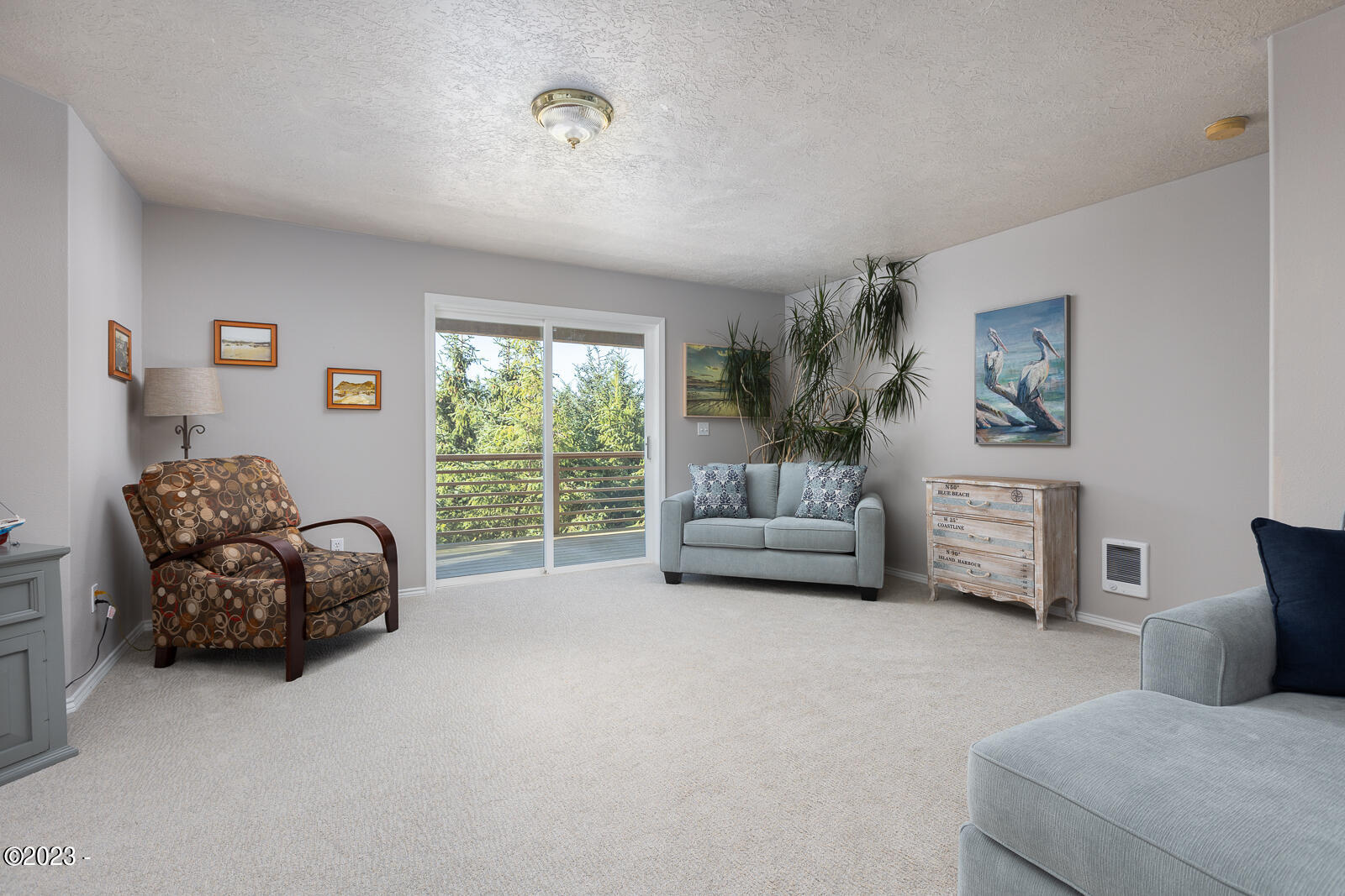 6250 Nestucca Ridge Road Pacific City, OR 97135 - Photo 16 of 31 a living room with furniture and a window