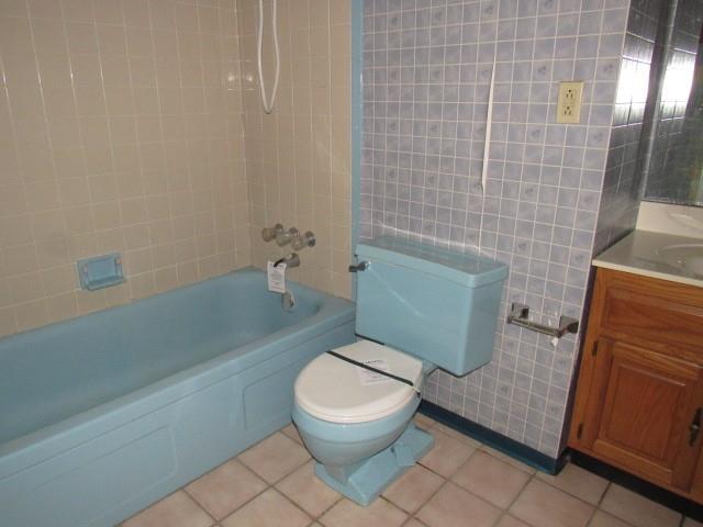 2207 Hall Drive Export, PA 15632 - Photo 14 of 24 a white toilet sitting next to a bath tub and a shower