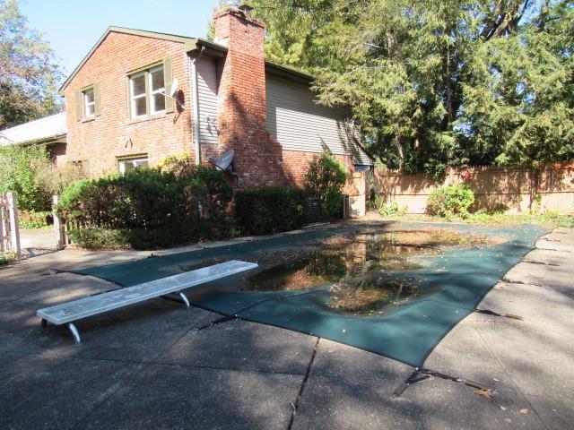 2207 Hall Drive Export, PA 15632 - Photo 2 of 24 a backyard of a house with trees and outdoor space