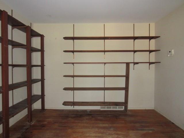 2207 Hall Drive Export, PA 15632 - Photo 6 of 24 a view of a book shelf in a room